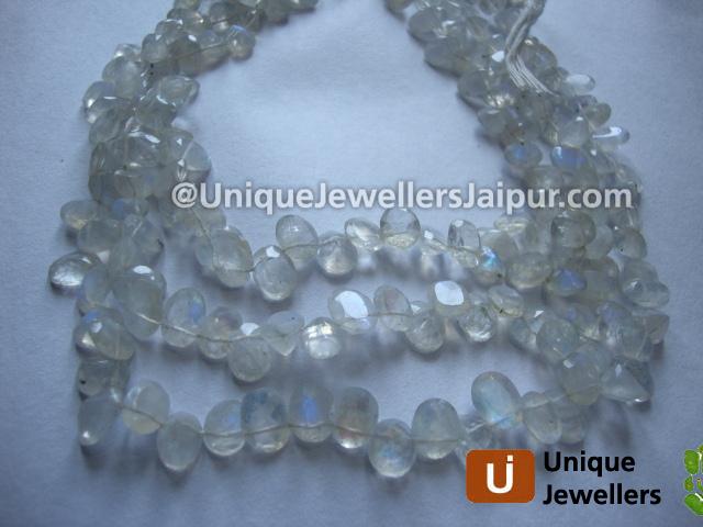 White Rainbow Cut Oval Beads